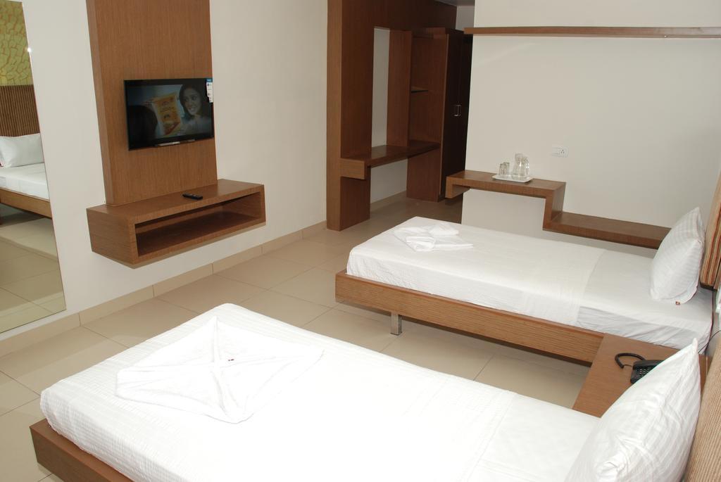 Hotel Pla Amrith Inn Tiruchirappalli Habitación foto